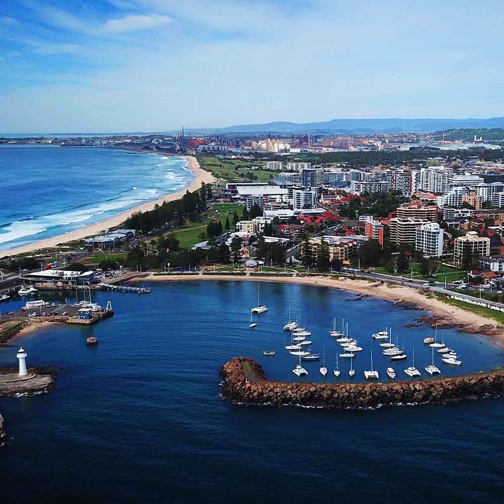 Aerial view of Wollongong harbour and beach