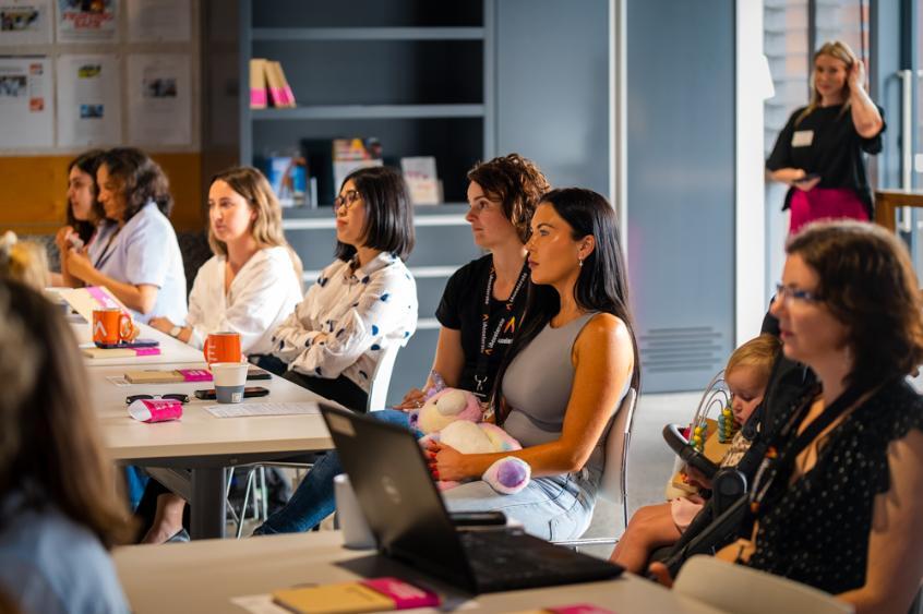 Women sitting in a workshop